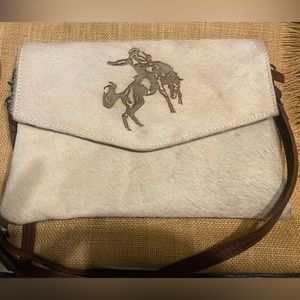 American Darling Cowhide
Bucking Horse Crossbody Purse